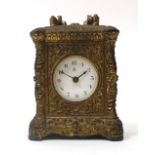 An American gilt metal cased Waterbury Clock Company carriage timepiece, late 19th century,