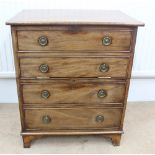 An early 19th century mahogany commode disguised as a chest of four drawers, now altered,