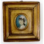 English School, 19th Century, A portrait miniature of a lady in profile, pastel, 6 x 6cm,