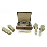 An ivory and shagreen mounted part dressing table set, early 20th century,