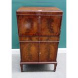 A 20th century inlaid mahogany cocktail cabinet,