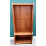 Robert "Mouseman" Thompson of Kilburn; a floor standing oak open waterfall bookcase with panel back,