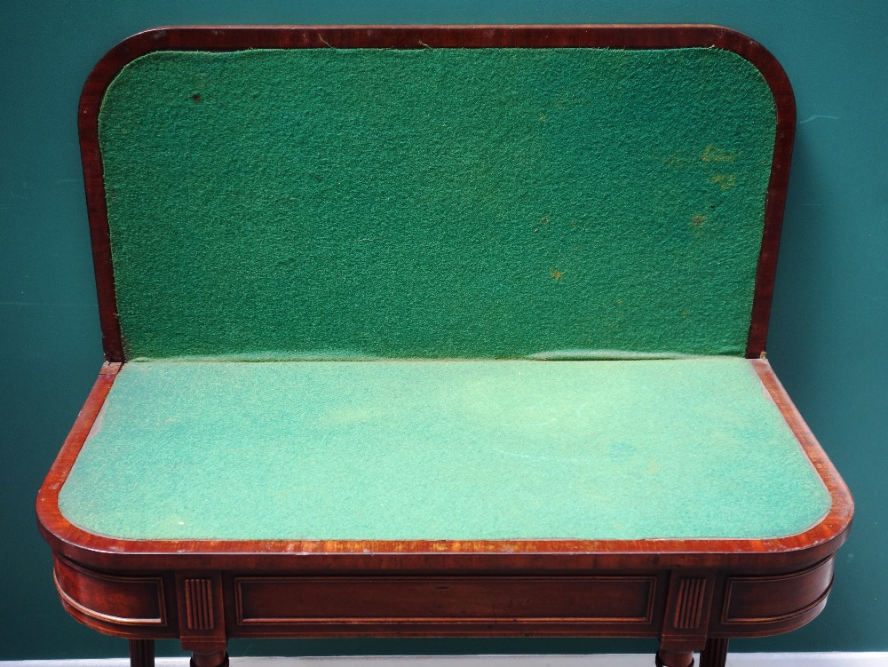 A Regency mahogany foldover card table, on tapering reeded supports, 91cm wide x 73cm high. - Image 3 of 3