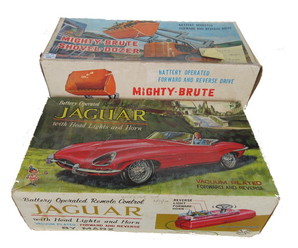 A Marx remote Jaguar, and a Marx Mighty Brute Shovel Dozer, both boxed (2).