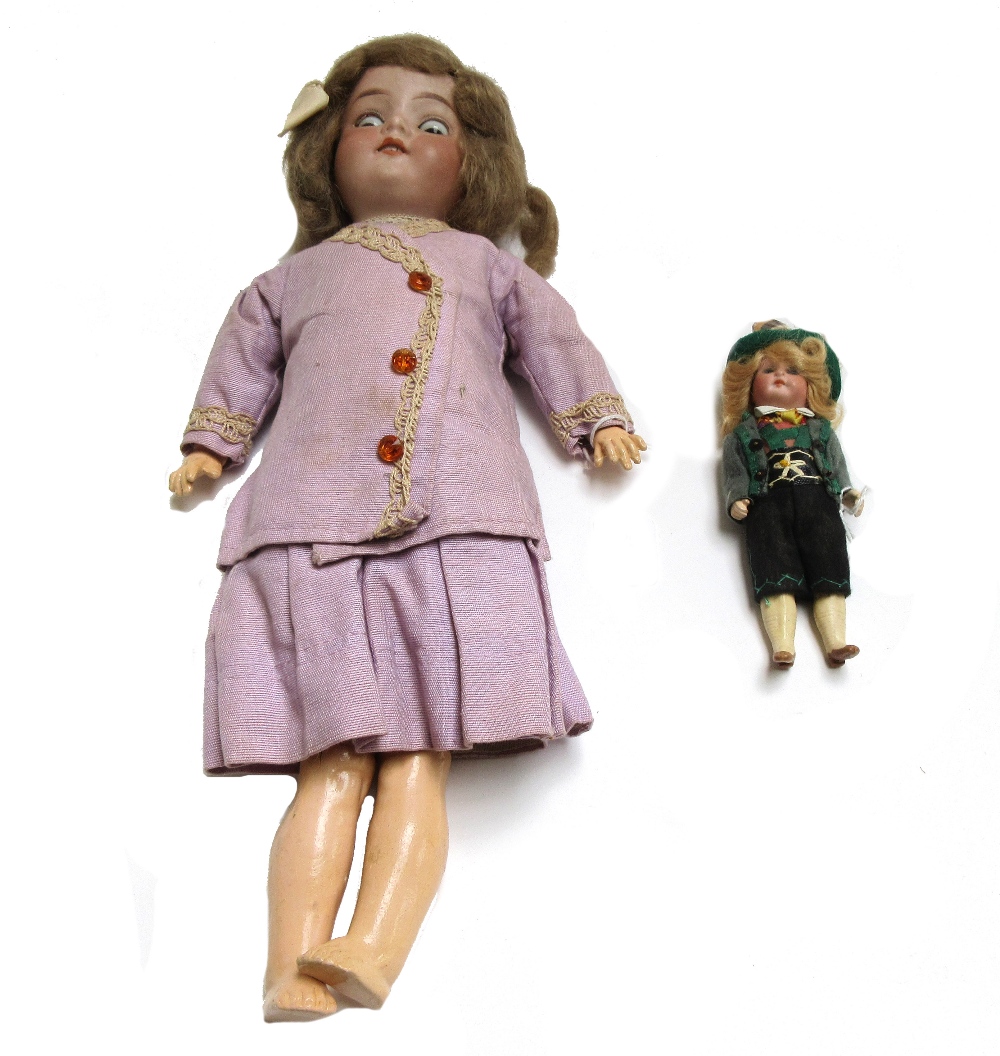 An Armand Marseille bisque head child doll, early 20th century, mould no.