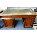 A 19th century French mahogany pedestal desk, with three frieze drawers,