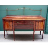 Maple & Co Ltd; a George III style inlaid mahogany sideboard,