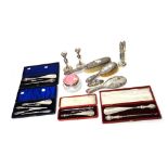 A group of silver mounted wares, comprising; four cased button hook and shoe horn sets,