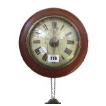 A mahogany cased postman's alarm clock with painted wooden 6 inch dial and an oak cased dial clock