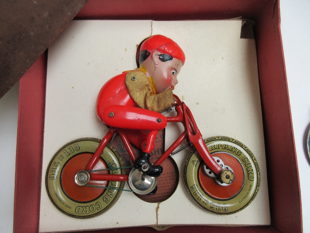 A Triang tinplate Gyro-cycle, boxed, and a tinplate wind-up lumberjack toy, 22.5cm wide (2). - Image 2 of 2