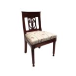 A diminutive 18th century style single chair, with stylized fleur-de-lis back, on turned supports,