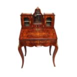 A Victorian marquetry inlaid figured walnut gilt metal mounted bonheur de jour,