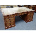 A large 18th century style walnut double inverted breakfront partner's desk,