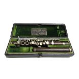 A Rudall, Carte & Co rosewood piccolo flute, two piece, with white metal keys and collars,