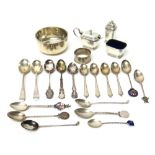 Silver, comprising; seventeen golfing teaspoons, including some having enamelled finials,