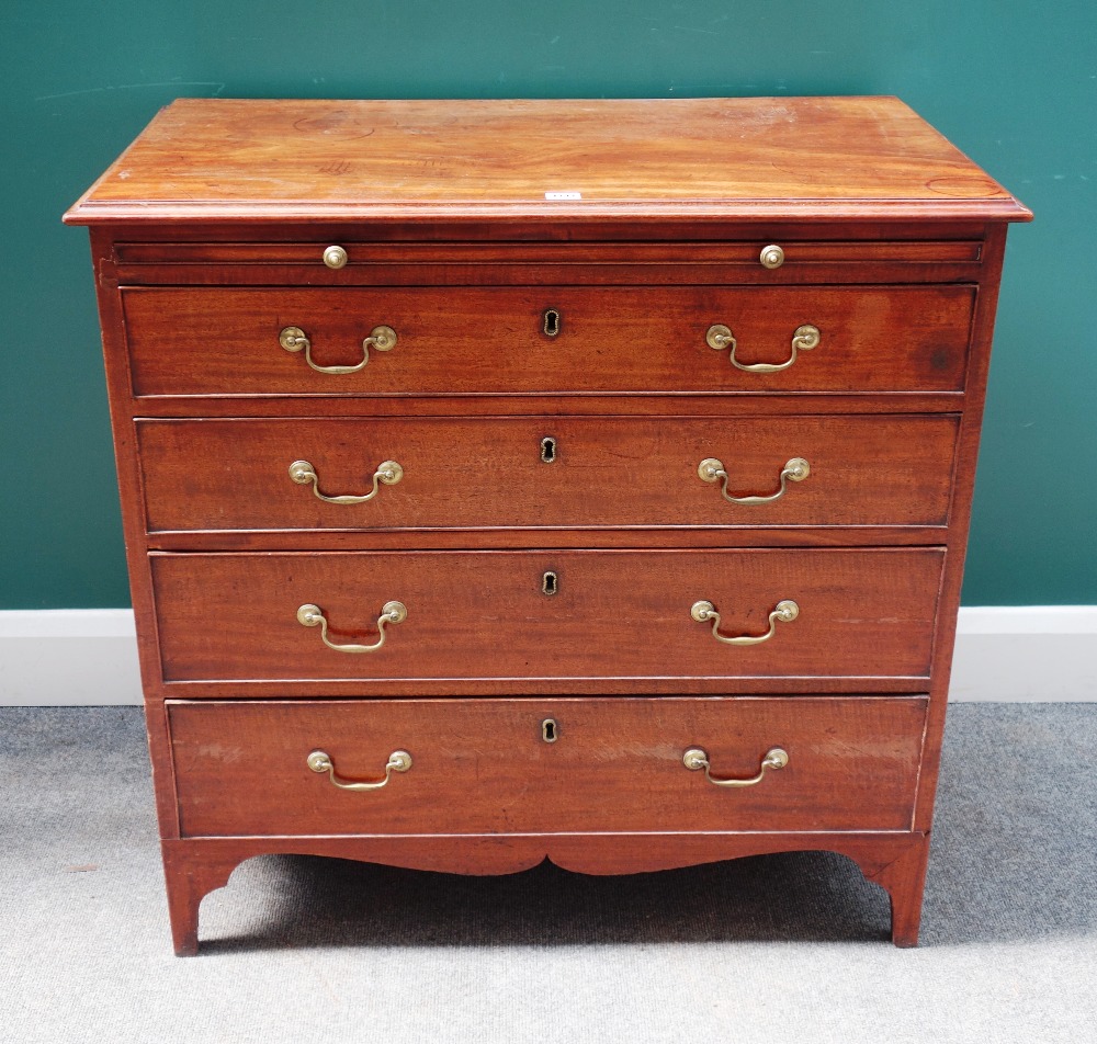 A George III mahogany chest, the brushing slide over four long graduated drawers, on bracket feet,