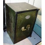 An early 20th century cast iron safe.