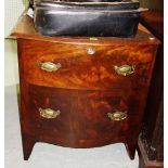 An early 19th century mahogany bowfront commode chest, with two dummy drawers, 66cm wide.