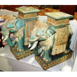 Two similar 20th century Oriental green glazed garden seats formed as elephants.