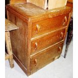 A 20th century oak three drawer chest, 61cm wide.