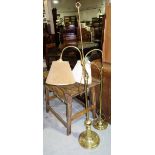 A 20th century brass adjustable standard lamp and another similar (2).