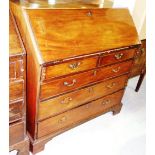 A 19th century mahogany bureau with fitted interior, over two short and three long drawers.