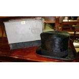 An early 20th century 'Dunn & Co' black velvet top hat.