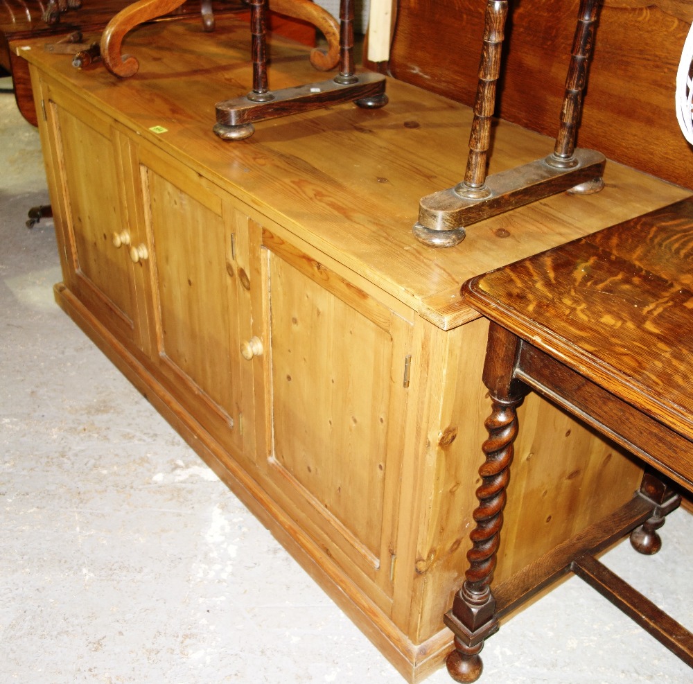 A 20th century pine low side unit. 152cm wide.