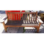 A 20th century teak garden bench.