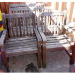 A pair of 20th century teak garden benches and two similar chairs.