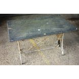 A rectangular garden table, with silver painted iron base and rectangular granite top, 122cm wide.