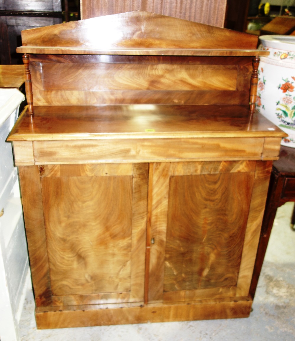 A 19th century mahogany chiffonier, with arched back and pair of panel doors. 92cm wide.