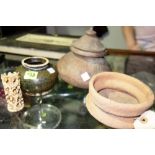 A group of three Oriental ceramic vessels and a small carved ivory figure.