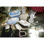 A group of decorative porcelain including miniature hands, Spode teapot,