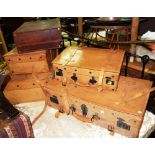 A set of four graduated tan leather suitcases made by 'Giovanni' and a one other.