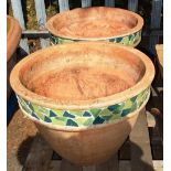 A pair of 20th century large terracotta planters, with green mosaic decoration, (2).