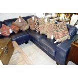 A 20th century blue leather corner sofa.