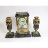 A French verde antico and ormolu mounted clock garniture, circa 1900,