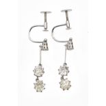 A pair of diamond pendant earrings,