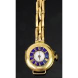 A lady's early 20th century 18ct gold half hunter cased fob watch, later adapted as a wristwatch,