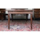 A Regency mahogany extending dining table, in the manner of Gillows,