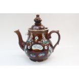 A Measham Bargeware teapot and cover, late 19th century,