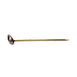 An early 20th century gold, sapphire, pearl and diamond stick pin, possibly Russian,