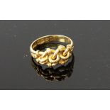 An 18ct gold ring, stylised circular link design, Chester, circa 1907, makers mark S.