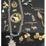 A collection of mostly costume jewellery, including; a curb link chain hung with a silver pendant,