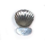 A George III silver caddy spoon, possibly John Kidder, London 1807, with scallop shell bowl,