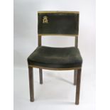 An Elizabeth II limed oak Coronation chair, upholstered in velvet, applied with the number '133'.