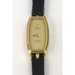 Omega: A lady's De Ville quartz wristwatch, gold plated shaped rectangular case,