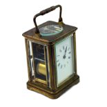 A French brass cased carriage clock, circa 1900, striking on a gong,