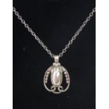 A Georg Jensen silver pendant, of open organic form, import hallmarks for London 1990, approx. 2.